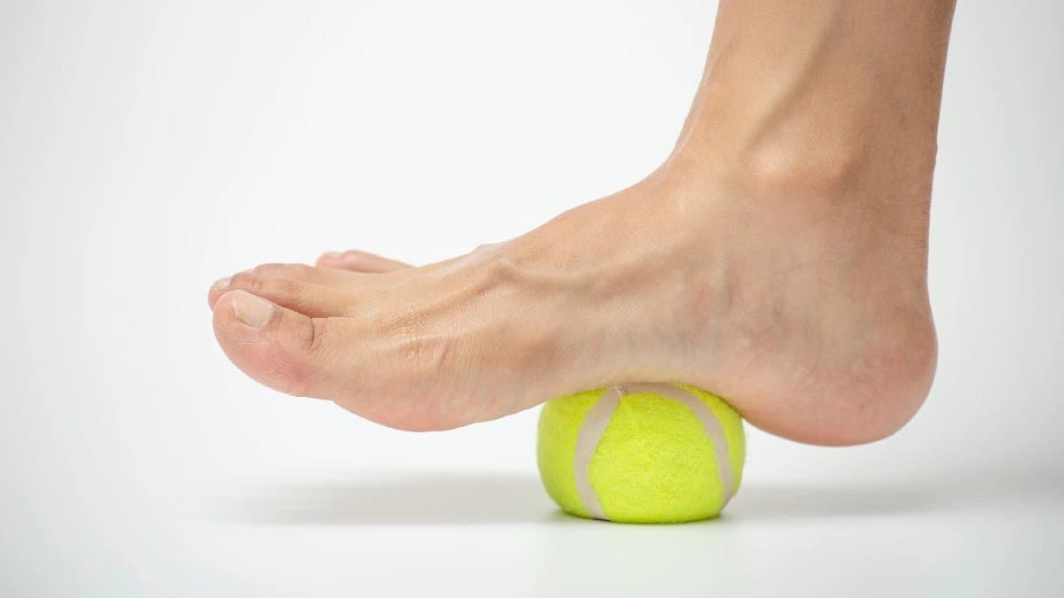 Tennis ball massage can help to improve leg muscle pain