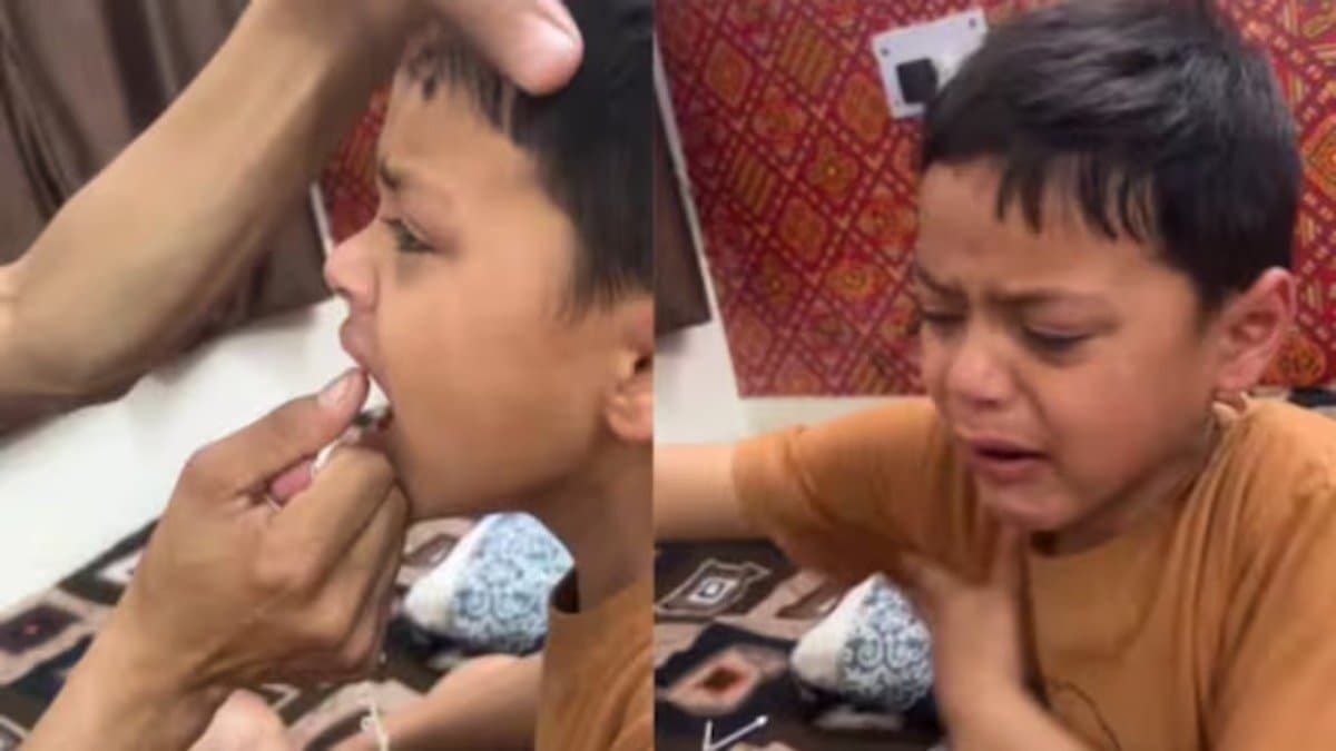Father Pulls Tooth Using Thread son crying loudly viral video