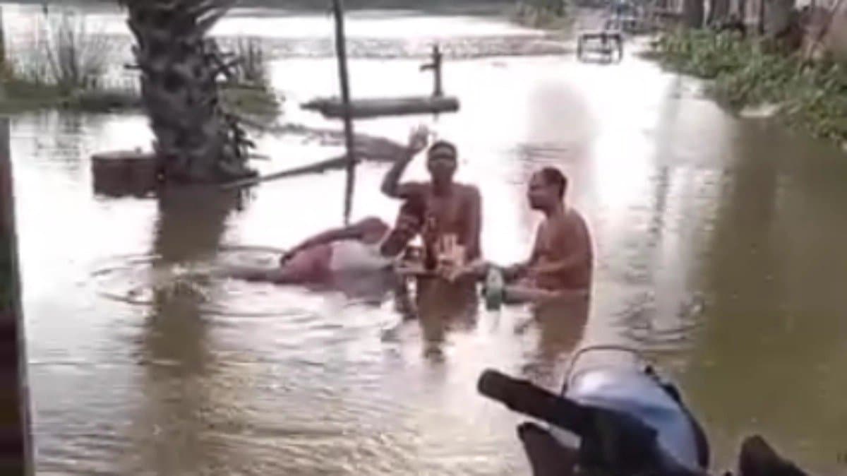 BJP leader was seen consuming liquor in flood affected area