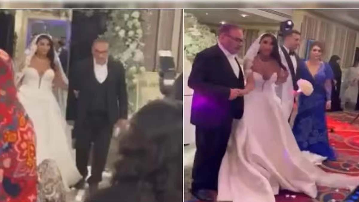Ali Shamkhani a pro-hijab leader close to Iran Supreme leader Khamenei is getting his daughter married in a strapless dress