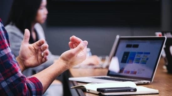Employee says he almost got fired for smiling during virtual meeting 