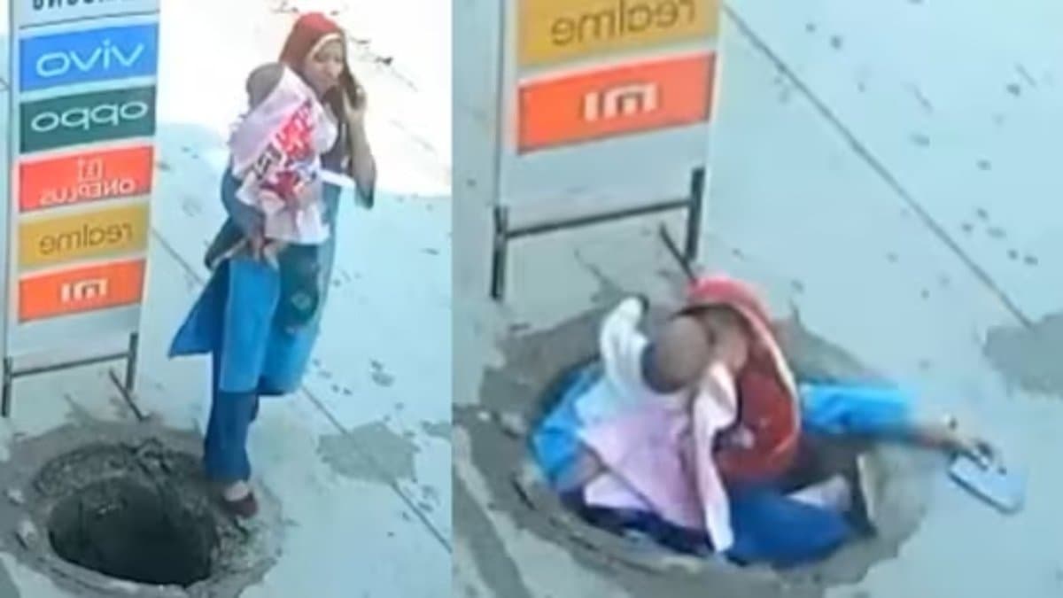 Woman Carrying baby fell into a manhole while talking on a phone gnr