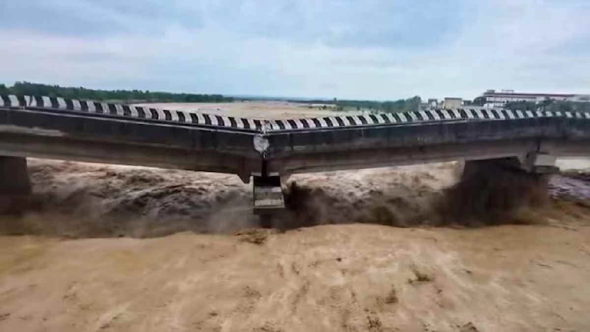 IMD Weather Update Heavy rains pound Jammu and Kashmir as key bridge collapses