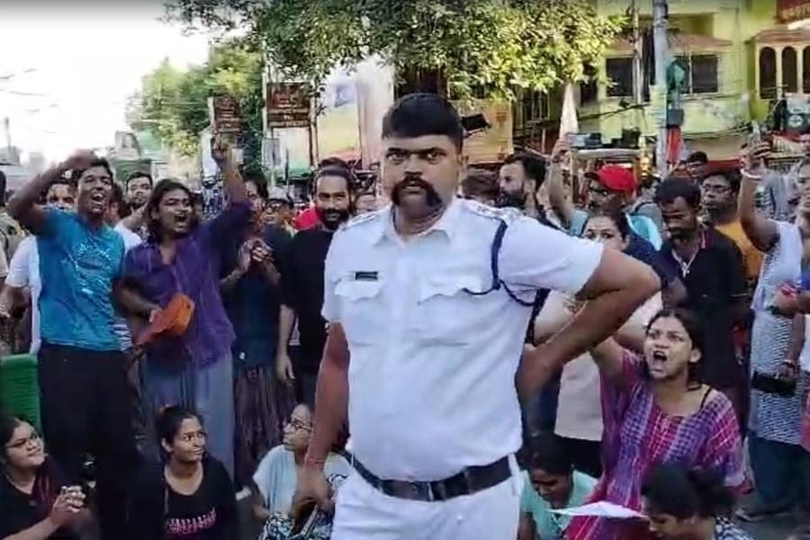 Students of RBU protests at BT road against a Civic Volunteer