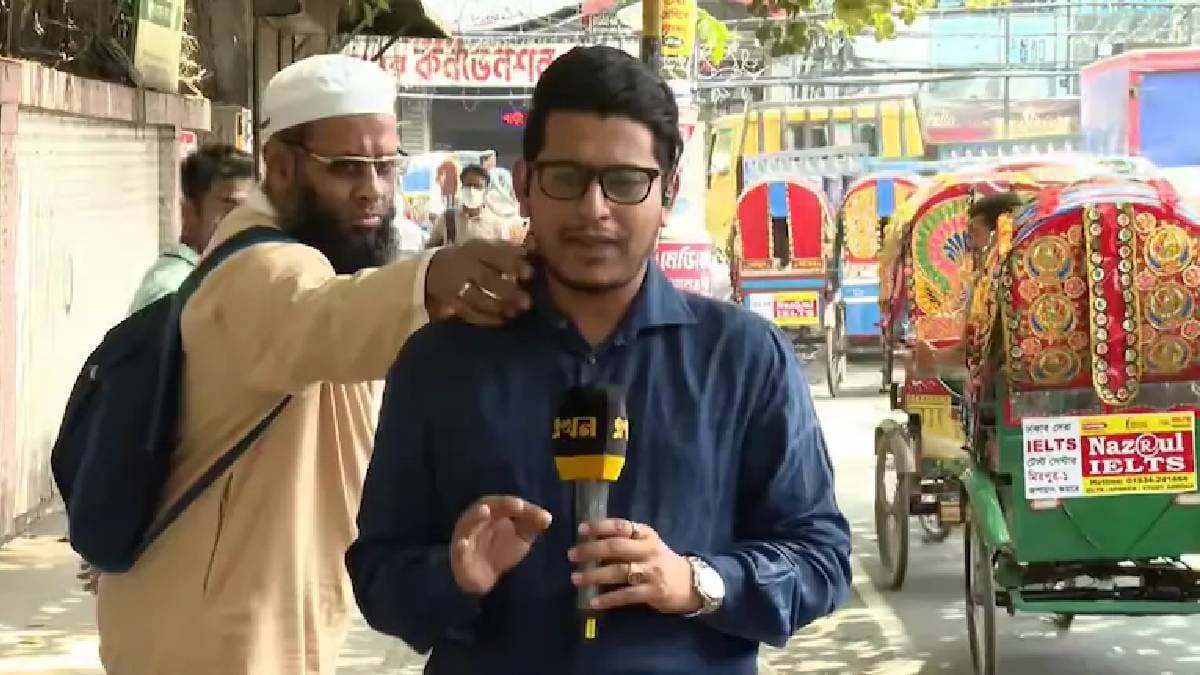 Stranger fixes Bangladeshi journalists collar during live reporting watch the viral video