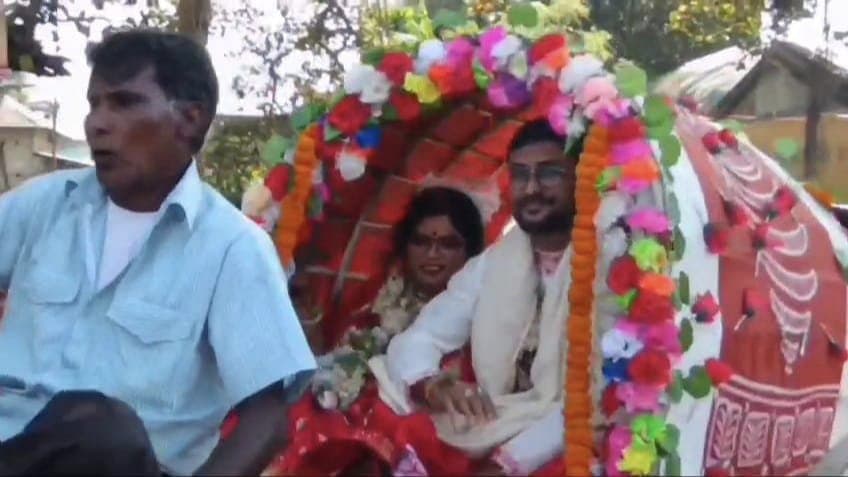 A newly married couple decides to hire bullock cart leaving modern cars