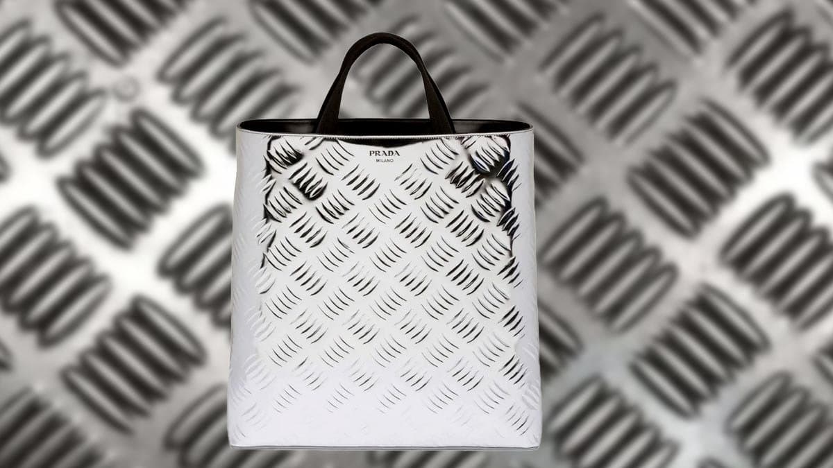 Prada's  Metallic Tote Bag Reminds Internet Of "Bus Floors"