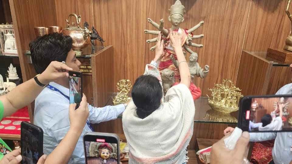 CM Mamata Banerjee ornamented ma durga idol in Kolkata airport biswabangla stall