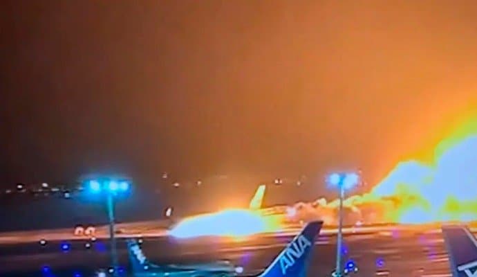 Japan Plane In Flames After Collision At Airport