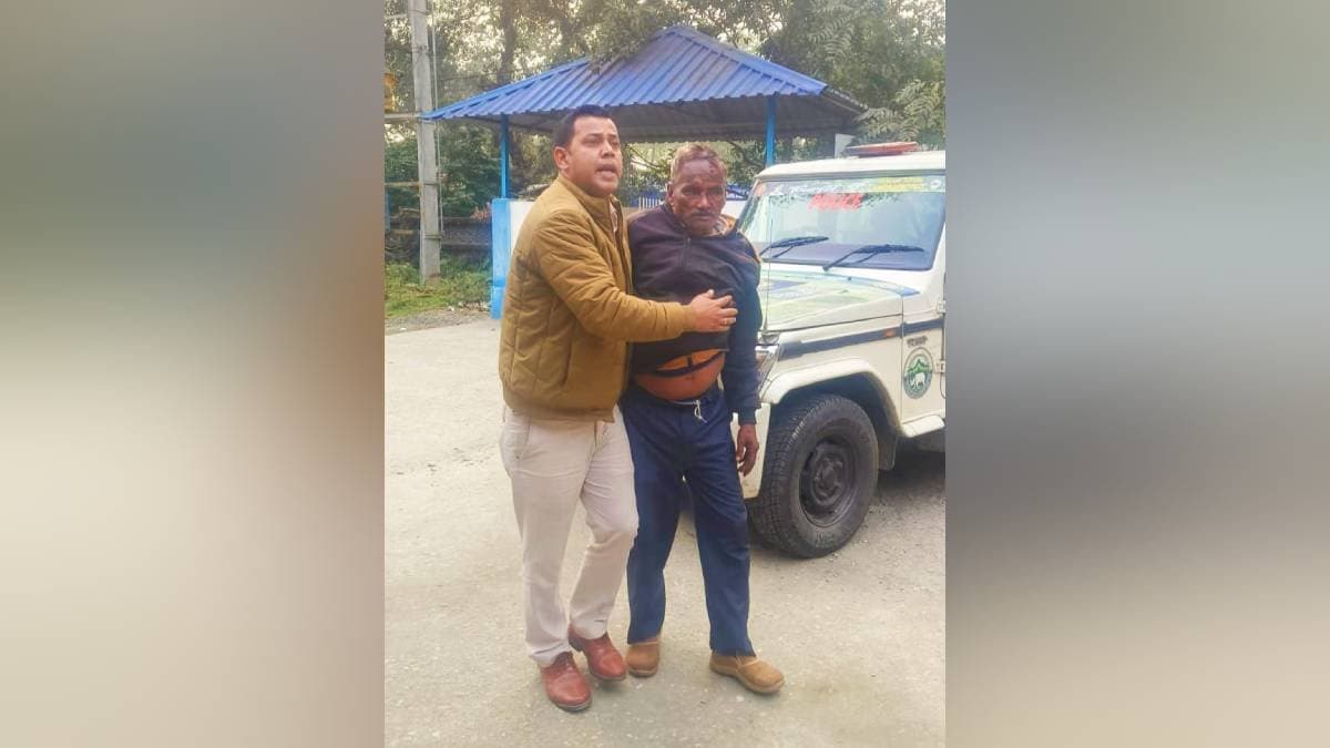 biker escapes elephant attack for policeman in gorumara national park