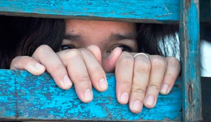 girl preparing for secondary examination after returns to society from trafficking
