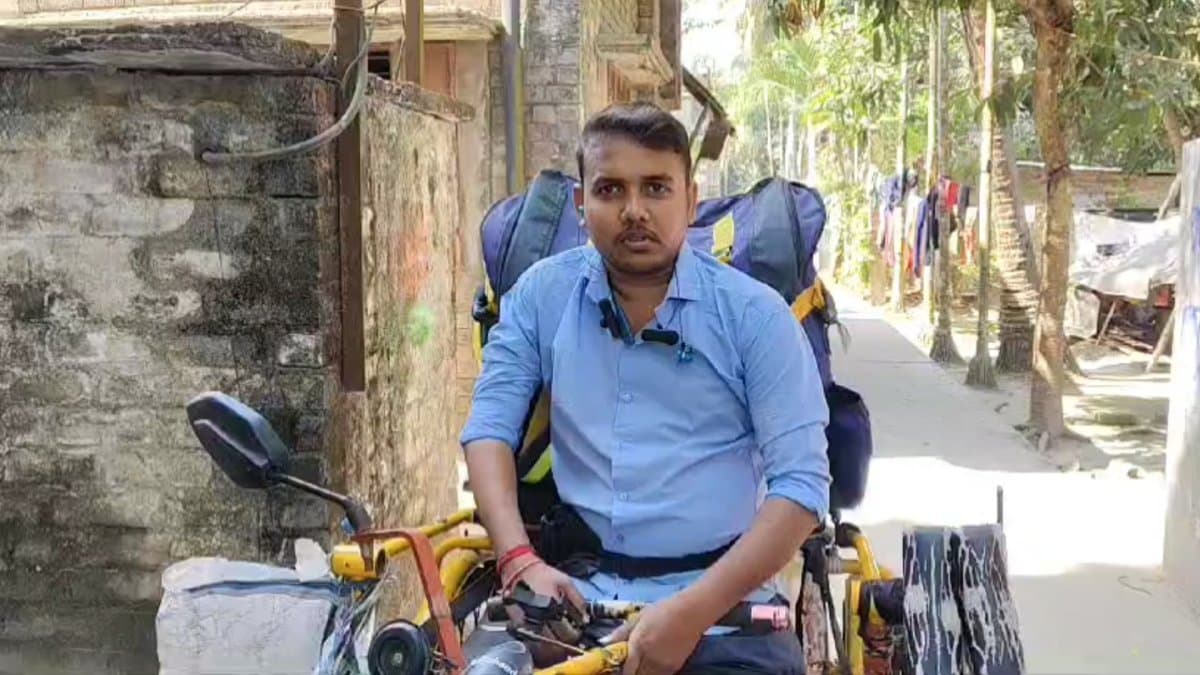 This specially abled youth from Gobardanga using tricycle to deliver food for his livelihood gnr