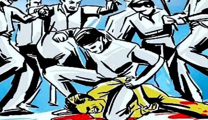 group of people beat man in canning