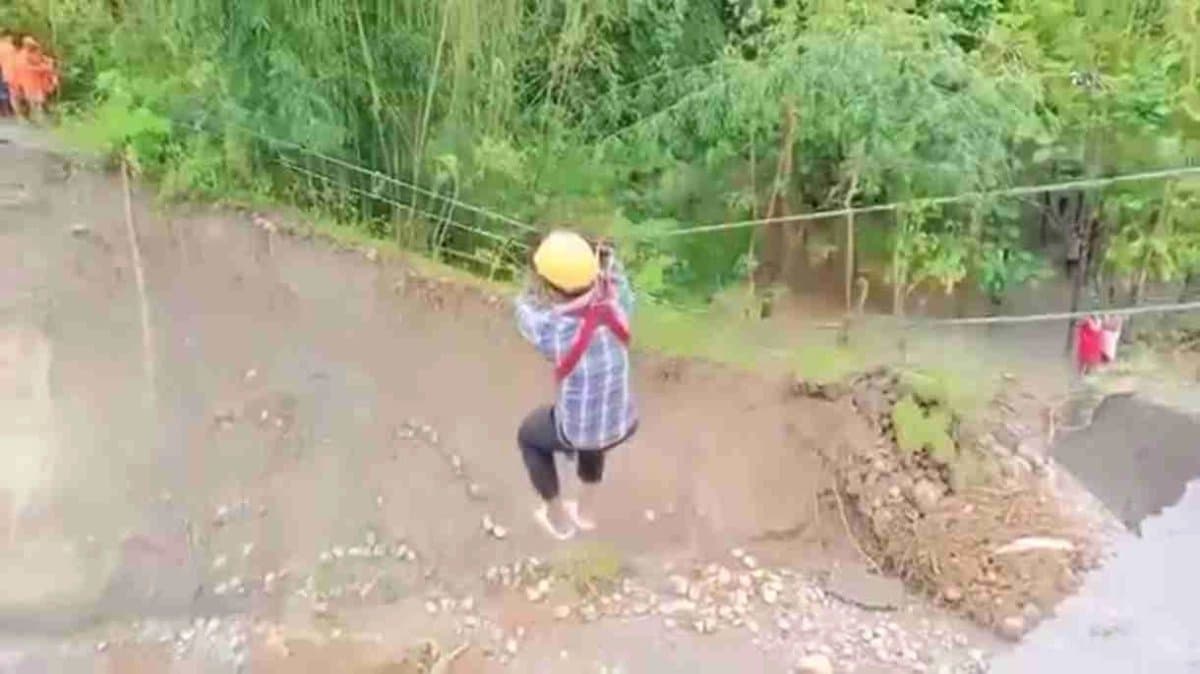 Physician reached to his patient with the help of rope in flood stricken area of North Bengal