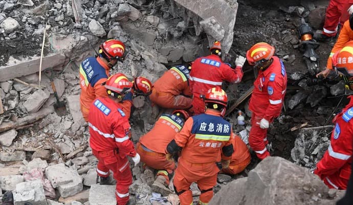 Heavy rain collapses road in south China, kills 24 