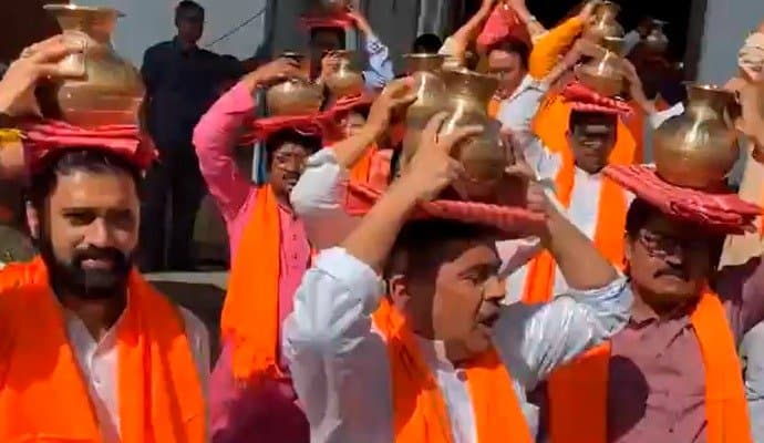 BJP mlas washed TMC dharna place with ganga jal