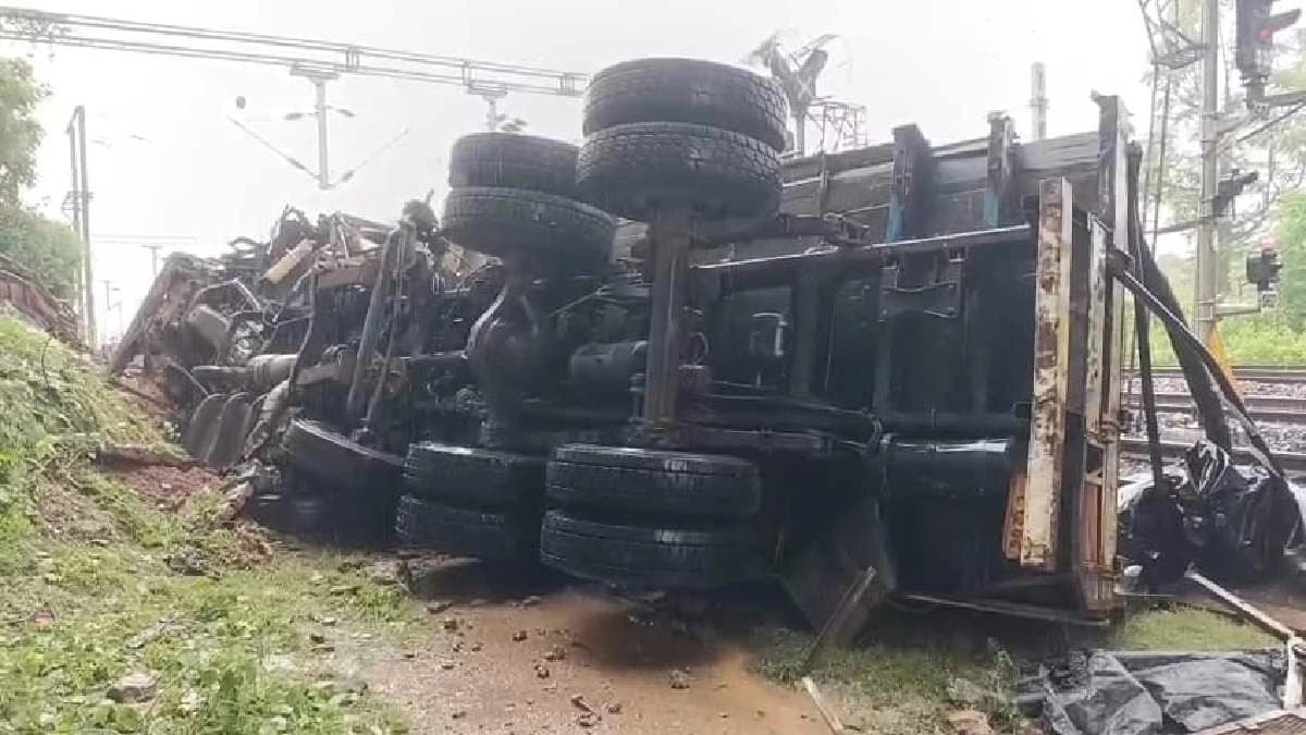 Tragic Accident: Goods Truck Crashes Through Flyover Railing Falls on Railway Tracks