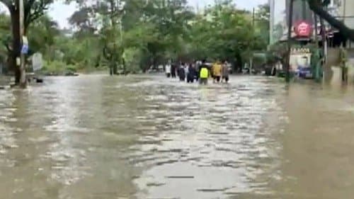 Car Gets Swept Away In Flooded Causeway