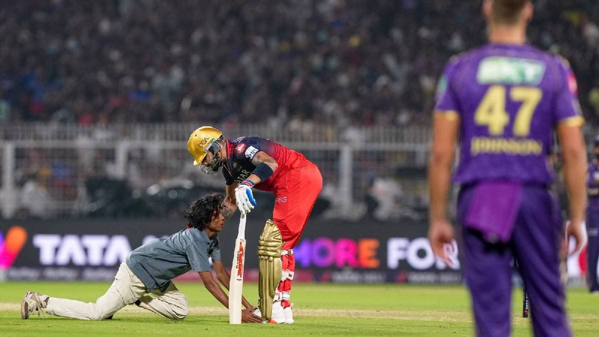 youth arrested after security breach at eden and touched feet of virat kohli during ipl match