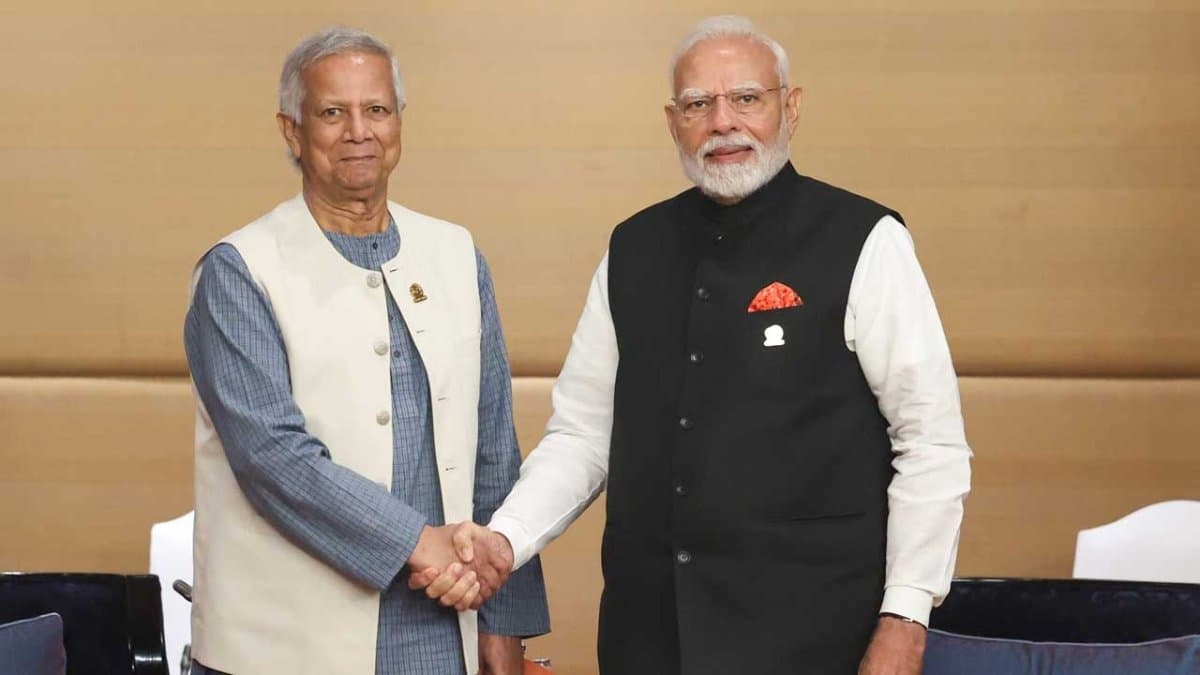 Prime Minister Narendra Modi and Muhammad Yunus shake hand at BIMSTEC summit