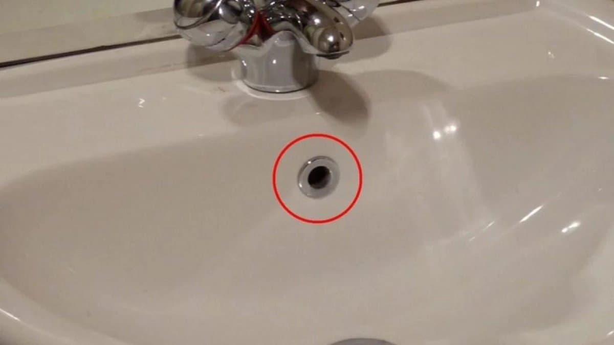 What is the purpose of extra hole in wash basin