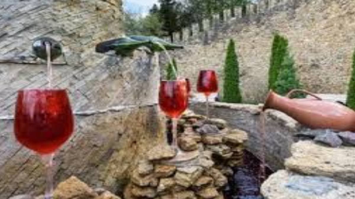 hills of Abruzzo in Italy in there is a fountain of red wine