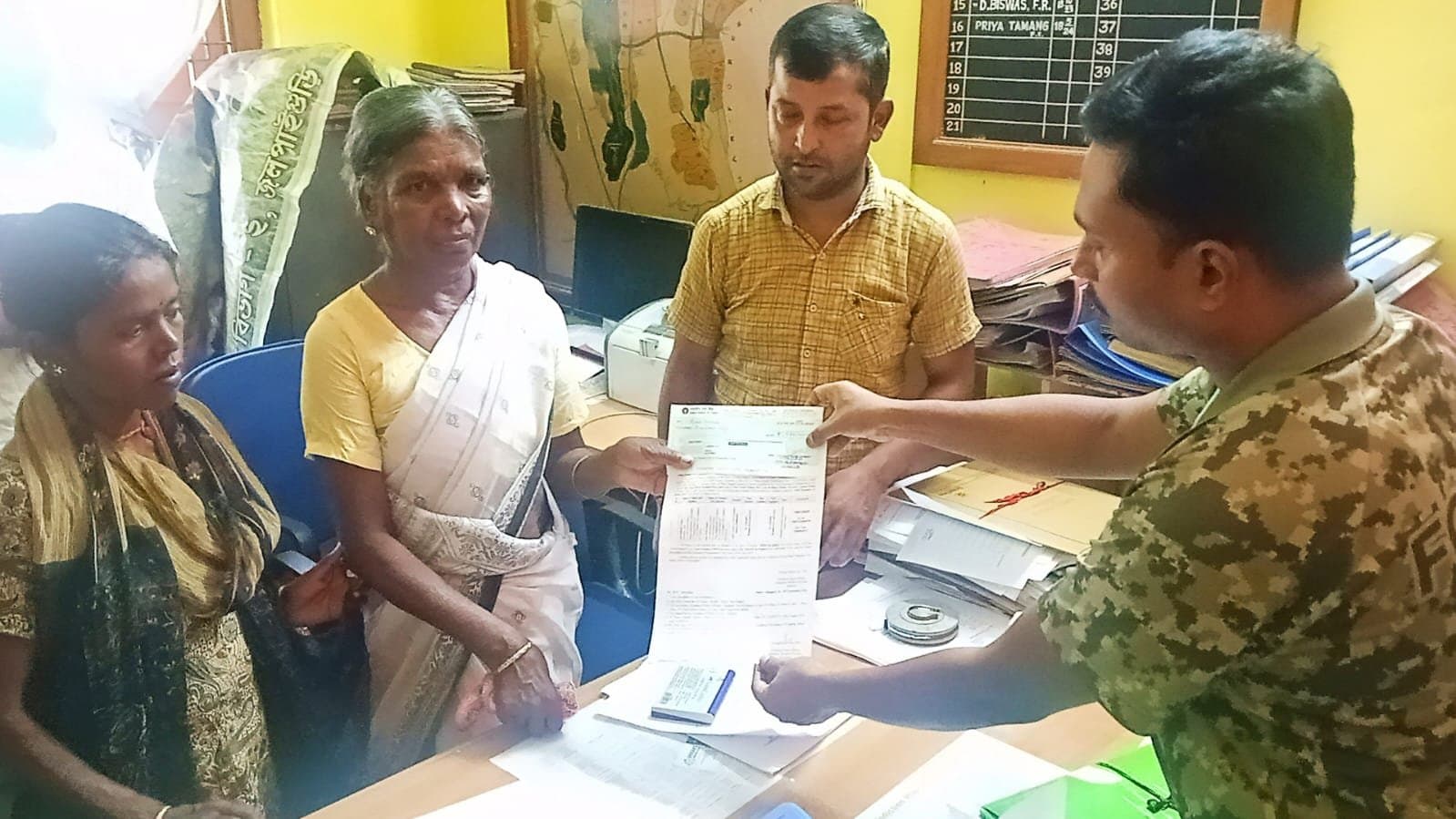 Death by elephant attack, compensation to the family by forest department gnr