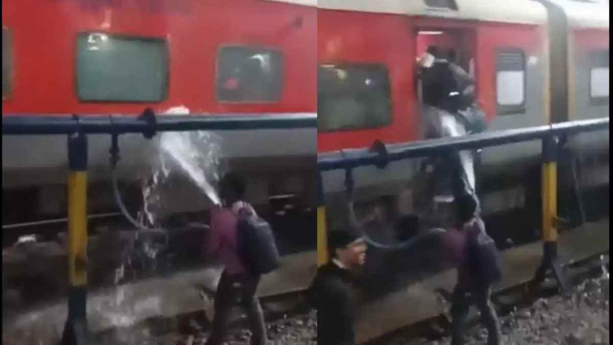 man throws water  at a train for no reason