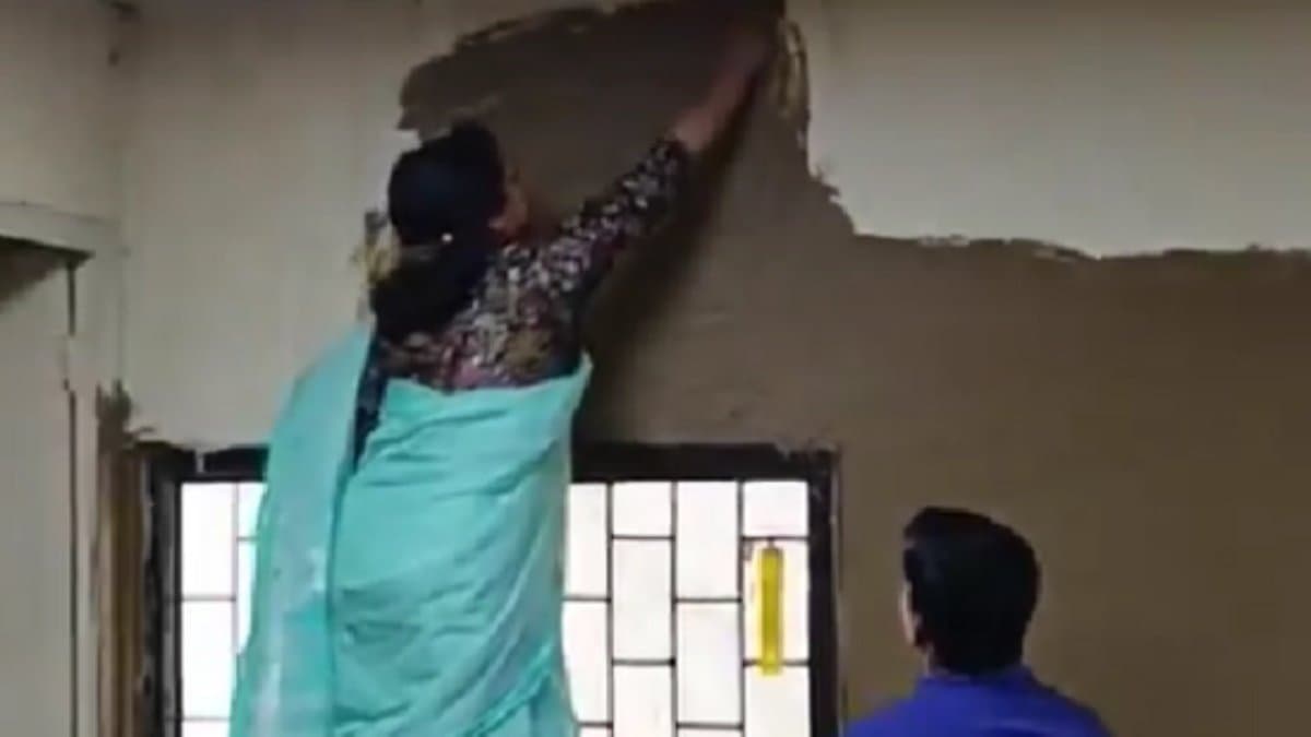 Delhi University college principal were seen coating classroom wall with cow dung video gone viral