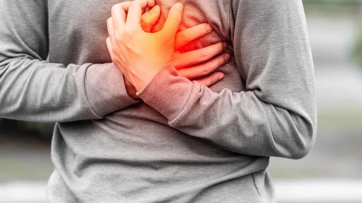 China man suffered a heart attack at the station while going to the office  still he wants to go to the office.