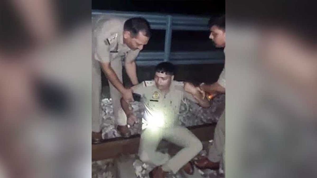 Aligarh cop sits on railway track to end life, alleges harassment by judge gnr 