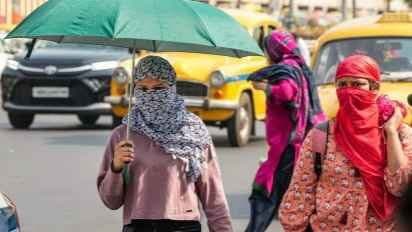 IMD Weather Forecast Moderate Rainfall in North Bengal Heatwave Warning in South Bengal
