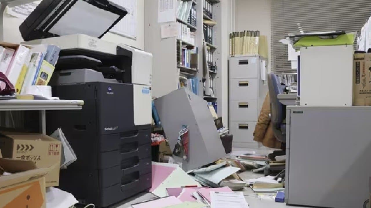 Japan earthquake Update Shaking walls flying papers here Video