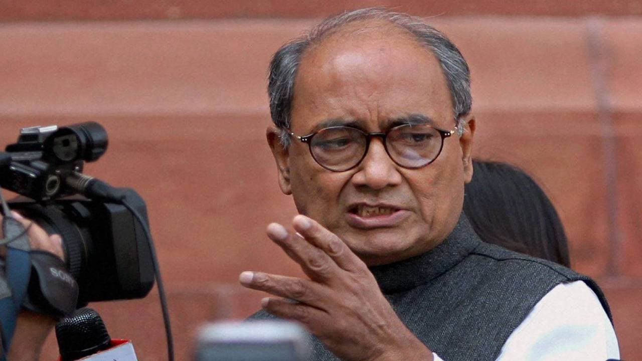 Digvijaya Singh stirs row with photo of PM Modi