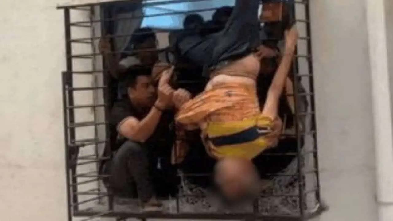 In Gujrat sleeping man falls from 10th floor avoids death as leg gets stuck in grille