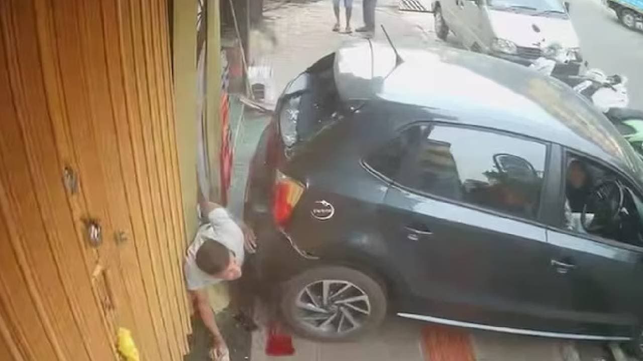 Drunk Boy reverses car into shop slams man against wall in Goa 