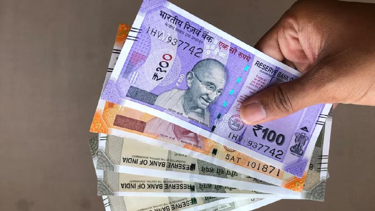 Rupee falls to record low against dollar