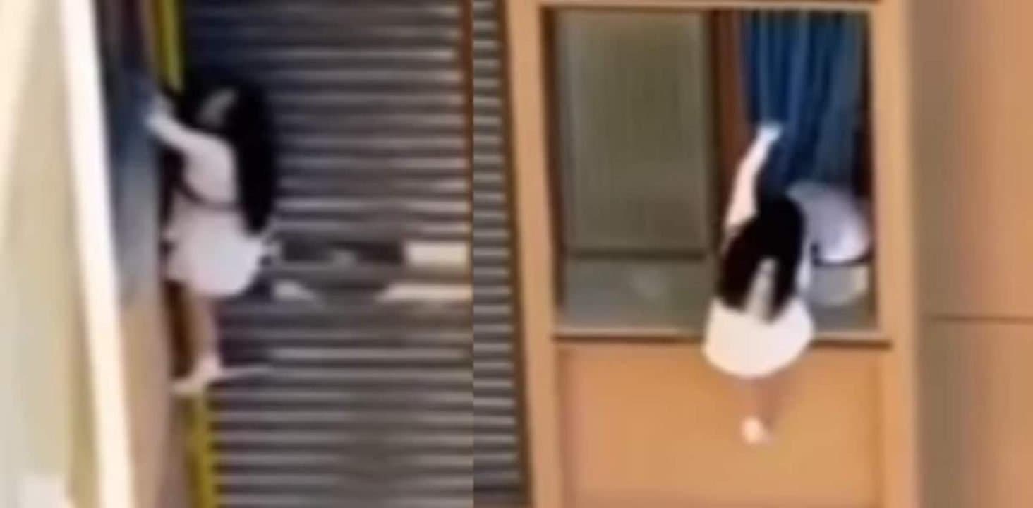 Chinese Woman Hangs From 10th Floor Window To Escape Lovers Wife 