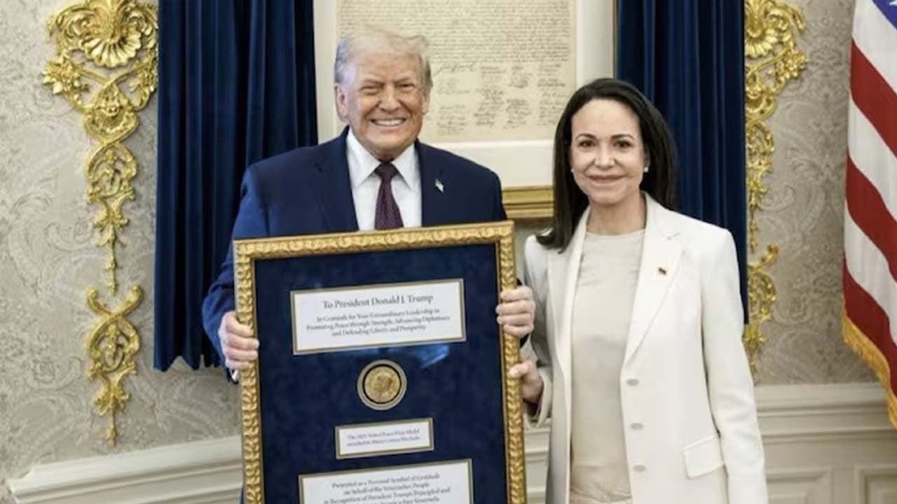 Venezuelas Machado presents her Nobel Peace Prize to US President Donald Trump 