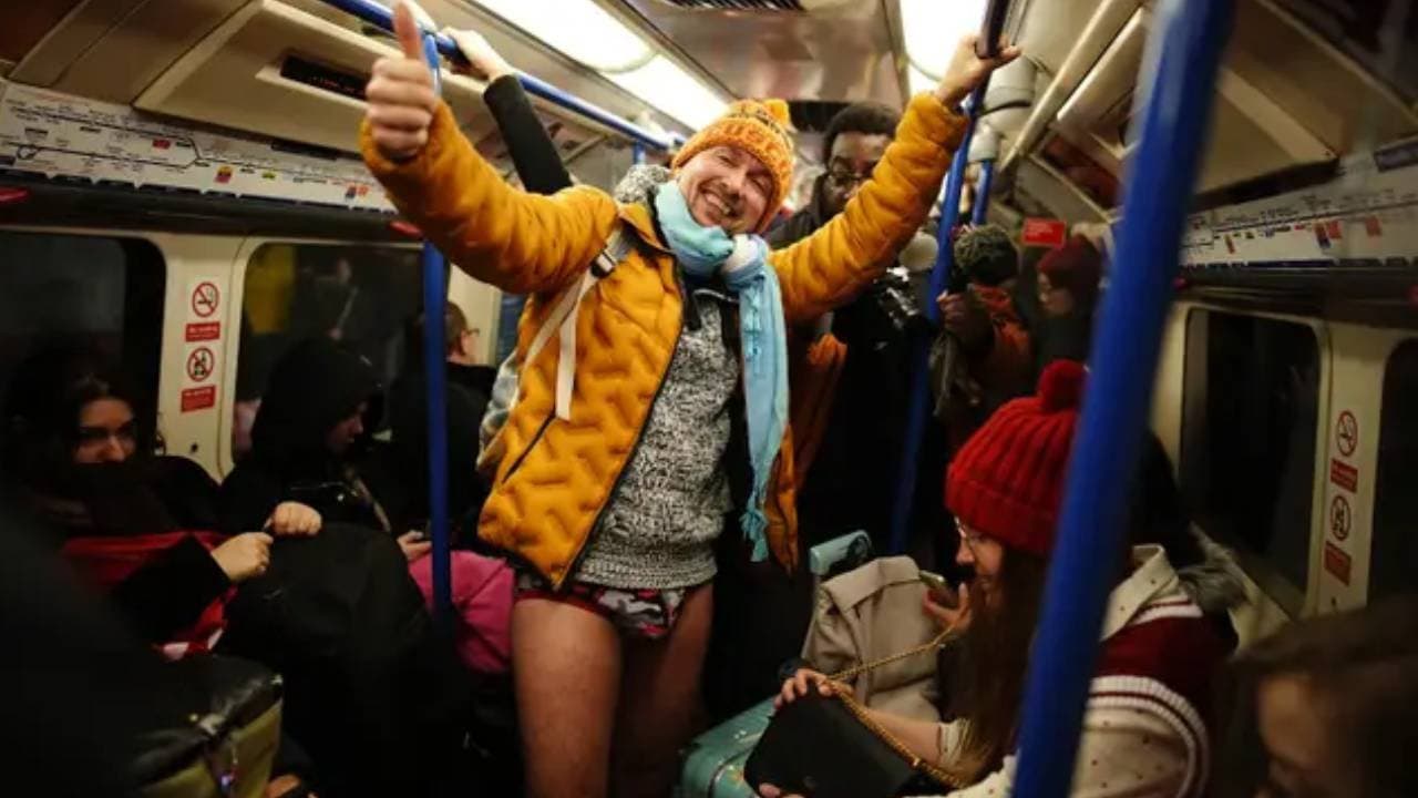 London people traveling in tube rail wearing underware