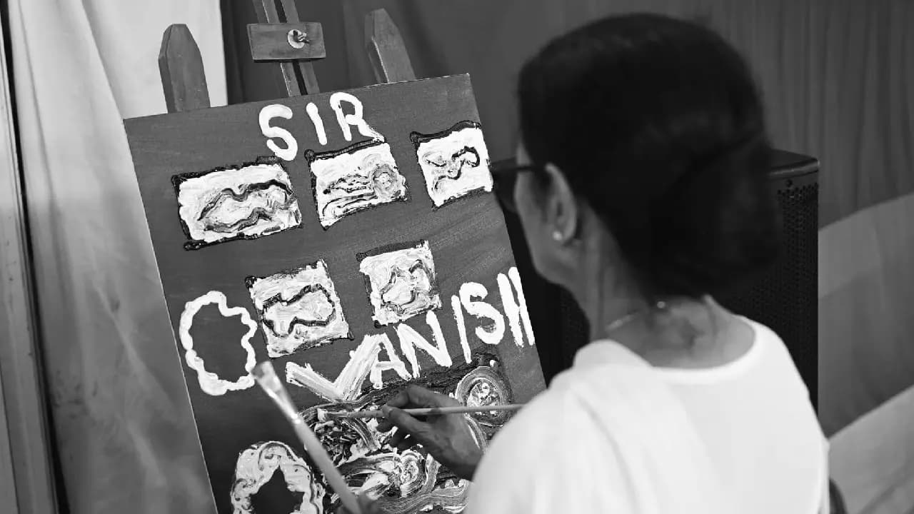 Mamata Banerjee Paints Symbolic Protest at Dharna