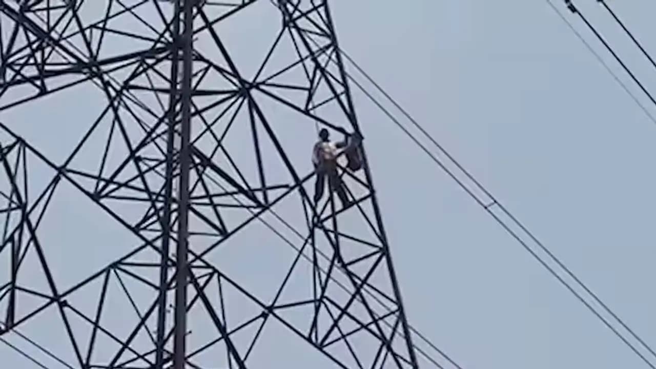 Youth climbs high-voltage tower to reclaim his land—creates a sensation in Raipur 