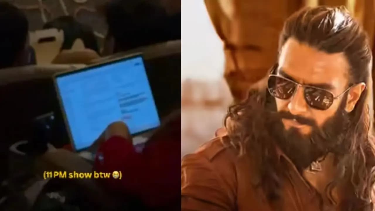 'Dhurandhar' is on, young woman busy working with laptop in cinema hall, viral video