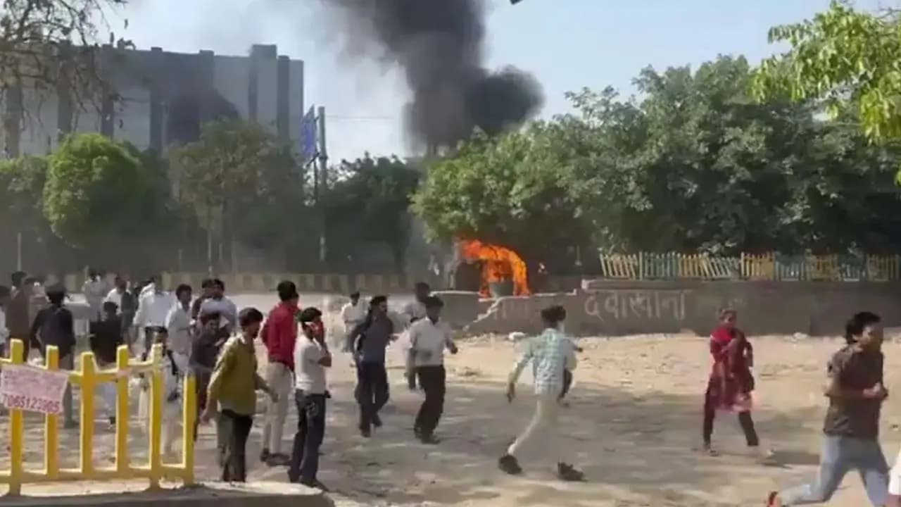 Vehicles set ablaze stones hurled Noida turns into a battlefield amidst workers  protests 