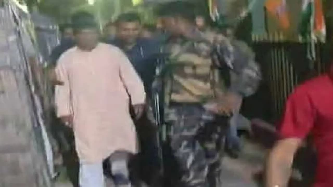 Coochbehar TMC alleged BJP candidate was caught red handed while distributing money among voters