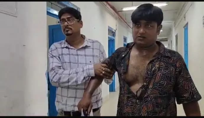 a Professor attacked by land mafia