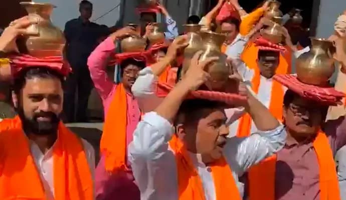 BJP mlas washed TMC dharna place with ganga jal