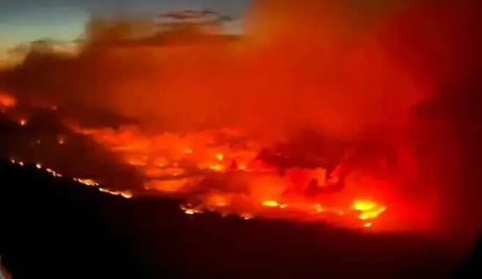 wildfire grows dramatically in western Canada