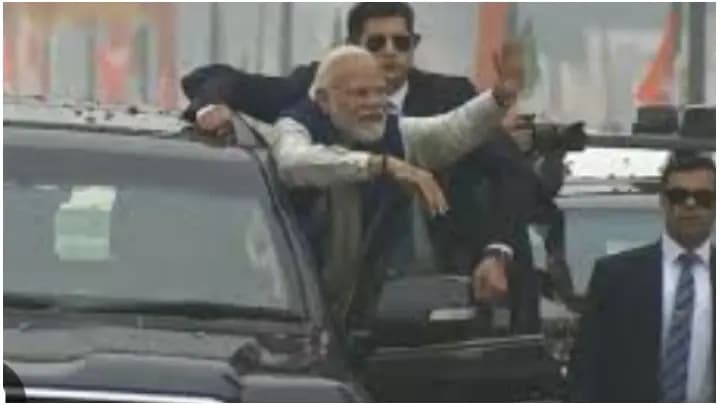 PM Modi Greets People During Roadshow In Ayodhya