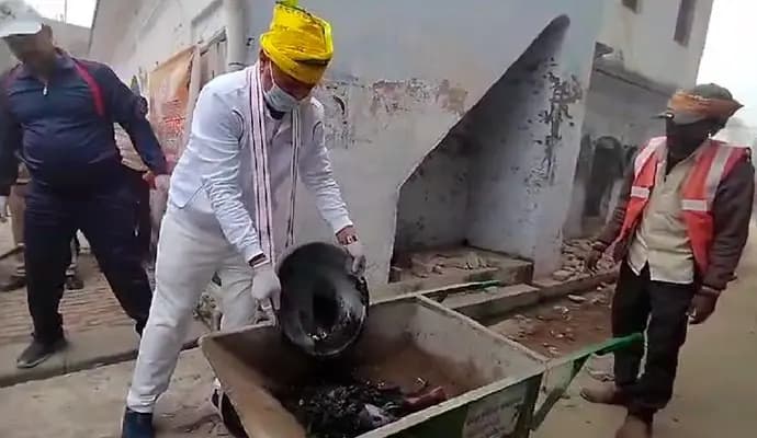 UP Deputy Chief Minister Cleans Drains, Roads